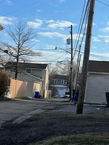Quiet alley moments under a crisp winter sky.